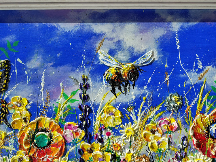 A colorful painting of a wildflower meadow under a bright blue sky, featuring a flying bee and flowers in yellow, red, pink, and purple tones.