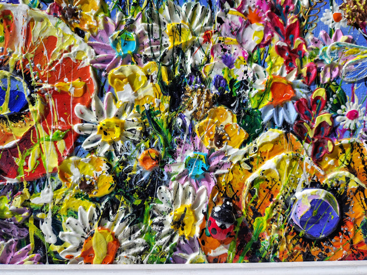 A vibrant, textured abstract floral painting filled with thick impasto brushstrokes of white daisies, yellow flowers, red blossoms, green stems, and splashes of blue, purple, orange, and black.